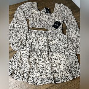 2 piece leopard print skirt set with a matching hair tie.